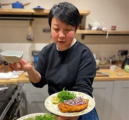 Peichin presents a plate of delicious looking food